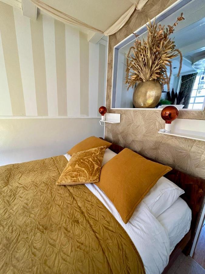 The Enlightened House Luxury Suites Amsterdam Bagian luar foto