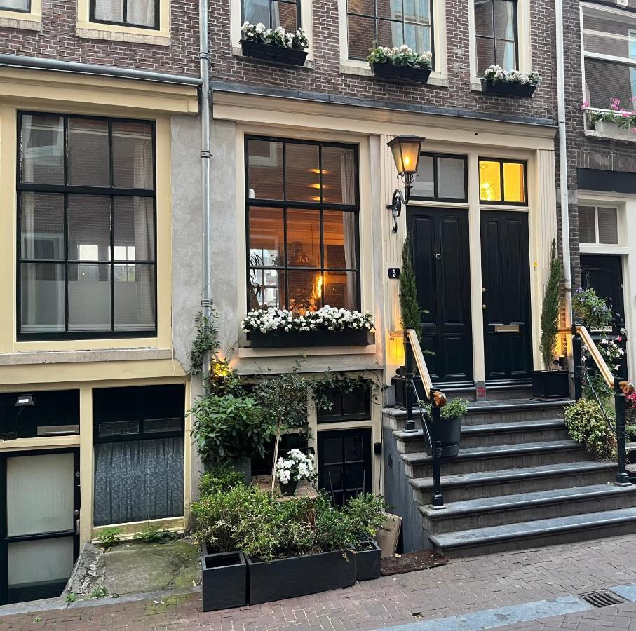 The Enlightened House Luxury Suites Amsterdam Bagian luar foto