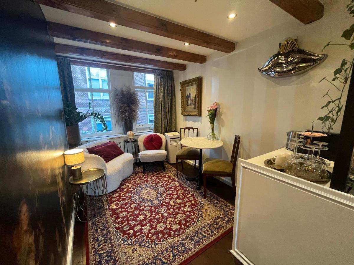 The Enlightened House Luxury Suites Amsterdam Bagian luar foto