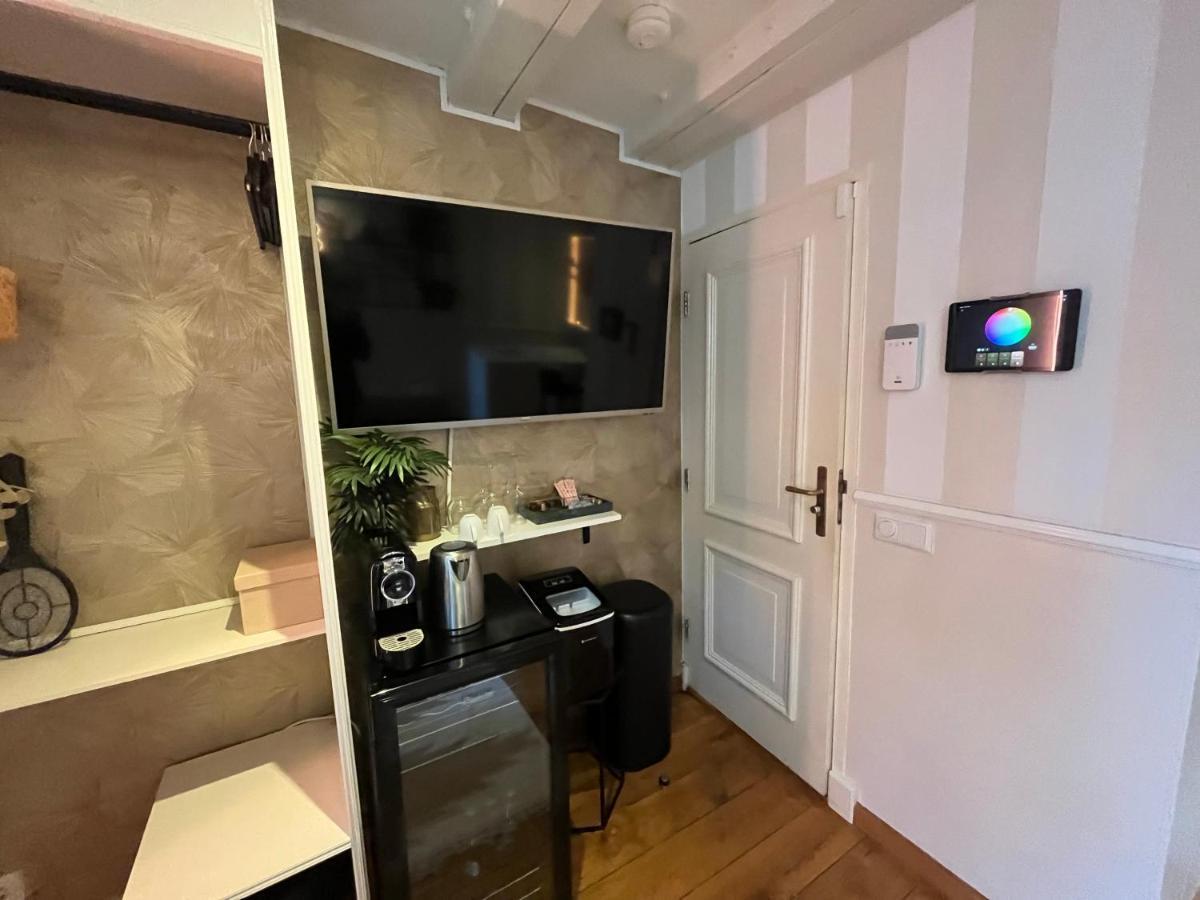 The Enlightened House Luxury Suites Amsterdam Bagian luar foto