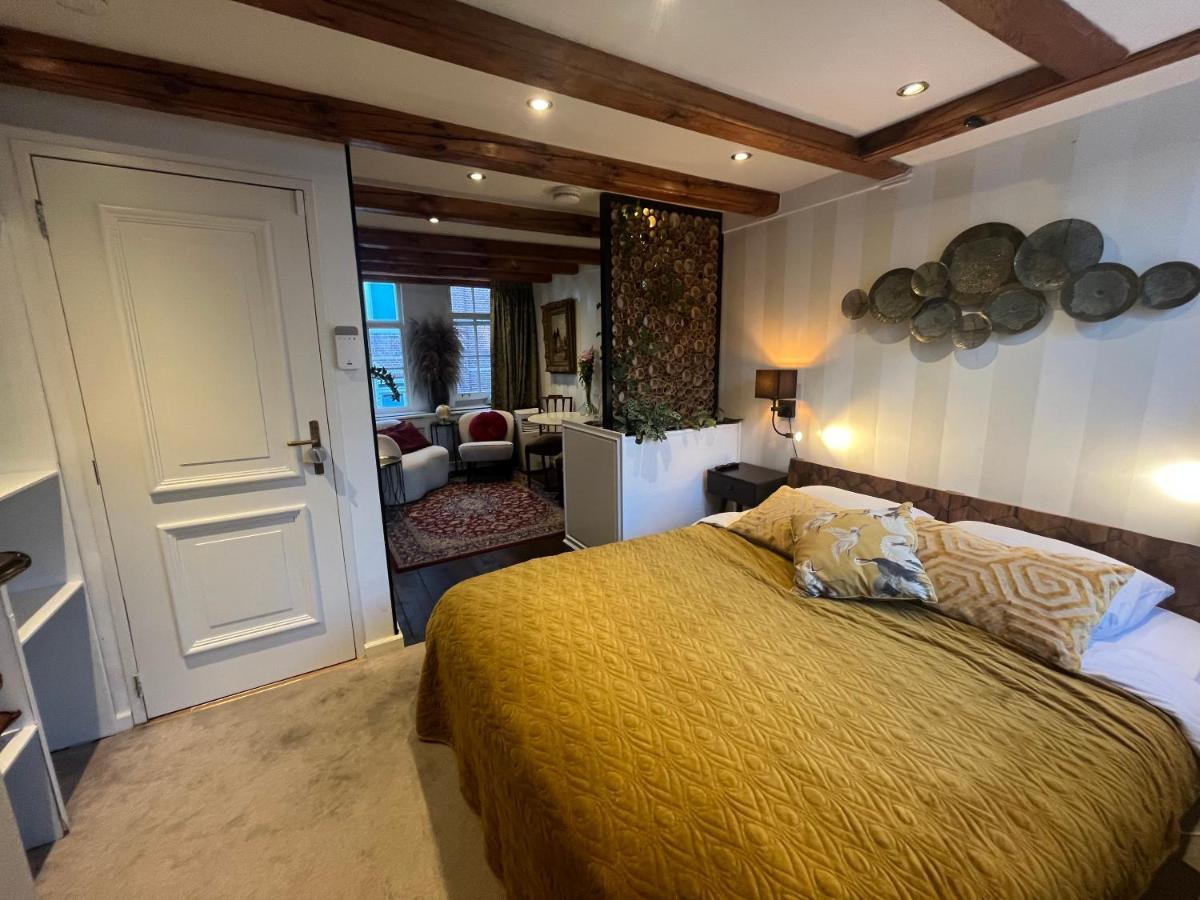 The Enlightened House Luxury Suites Amsterdam Bagian luar foto